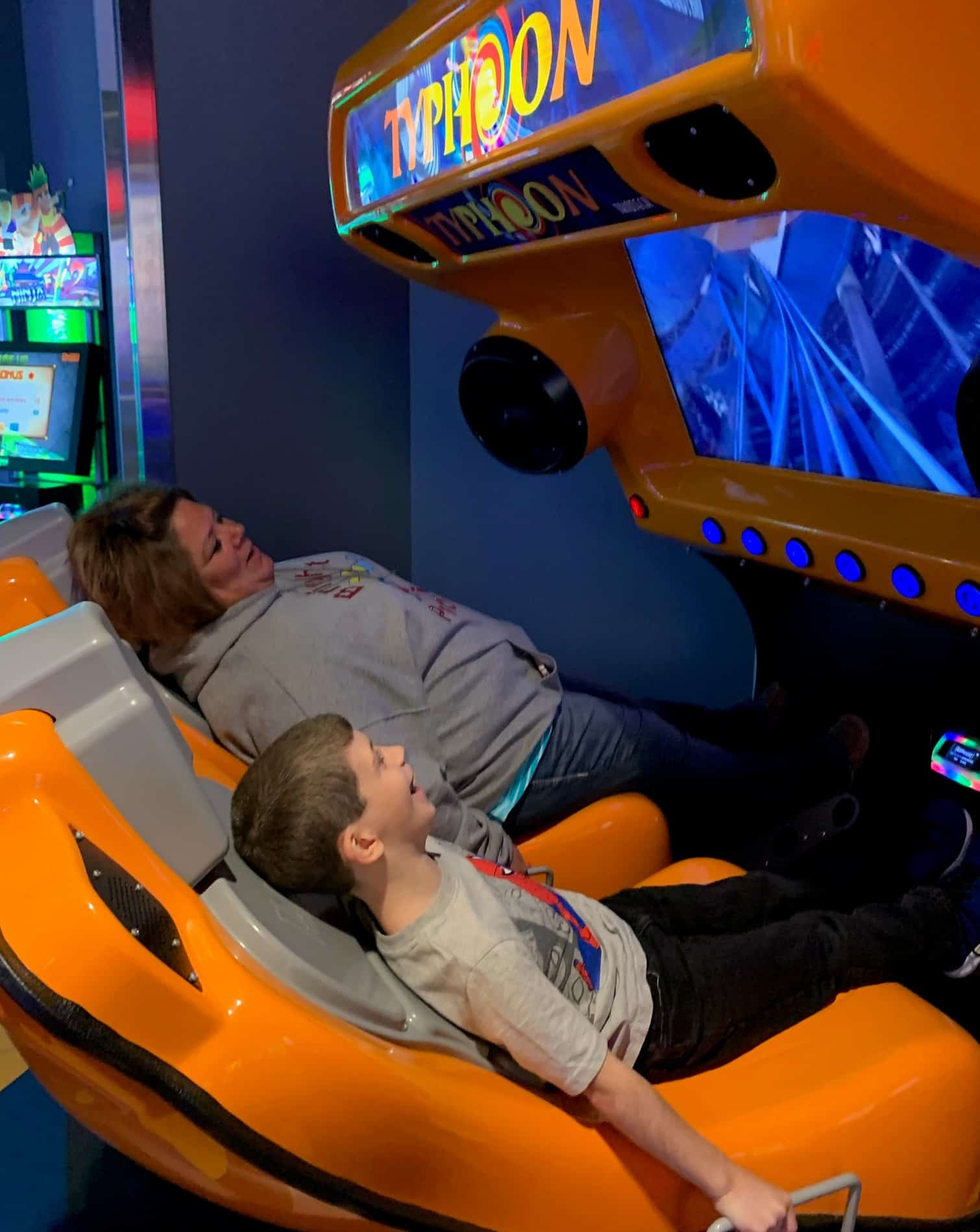 Pupil Ryan Babcock, at left, with aide Jen Kellar taking a virtual rollercoaster ride